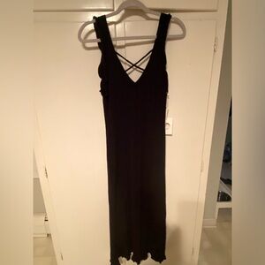 Anthropologie Black Long Ruffled Tank Dress
Crisscross Back Size Medium